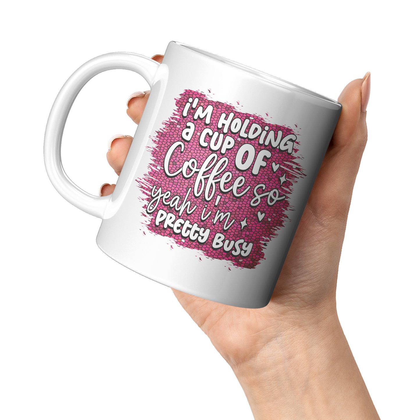 I'm holding a cup of coffee