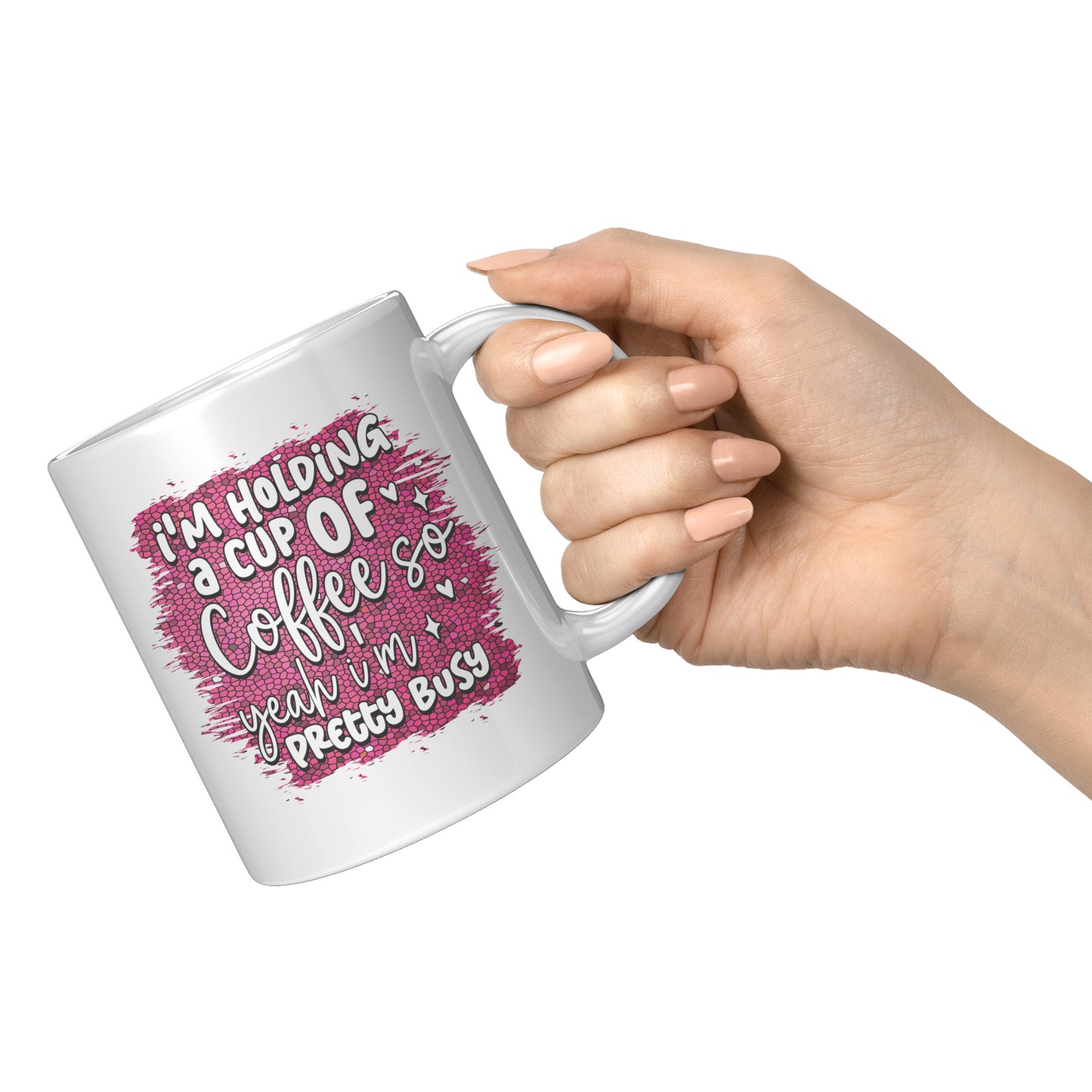 I'm holding a cup of coffee
